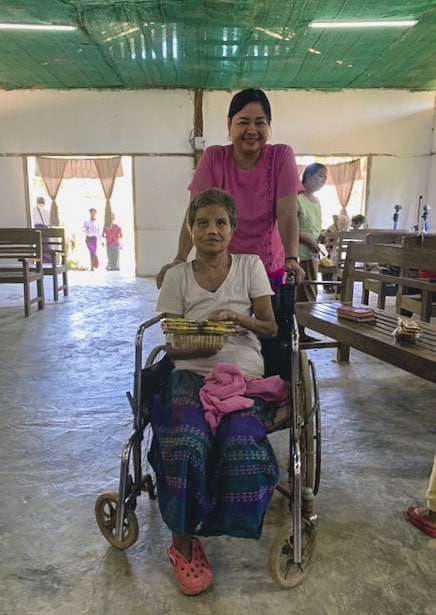 sharon yone mo with a leper woman in the colony in myanmar